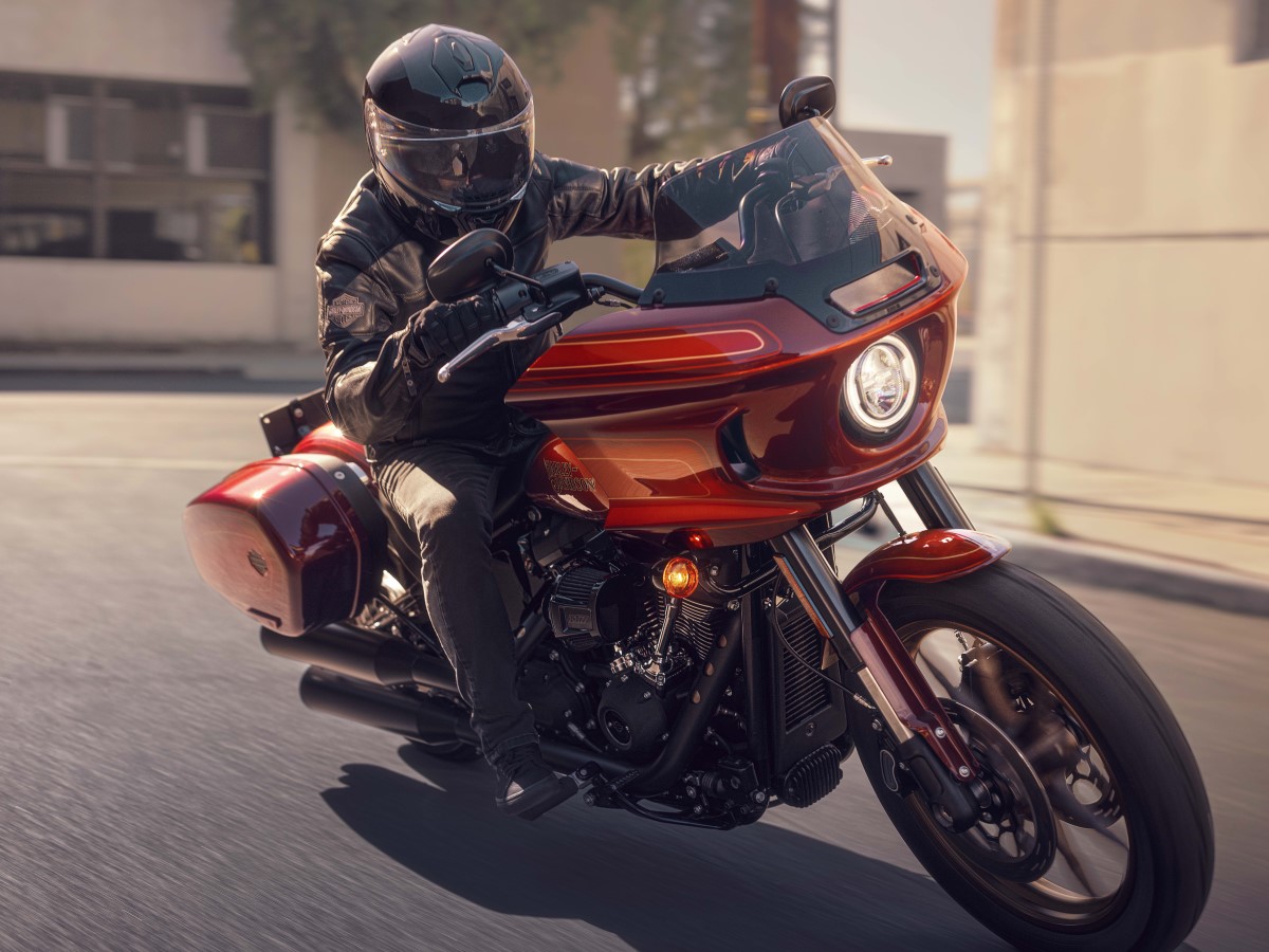 Rider cornering on a Harley-Davidson Low Rider El Diablo.