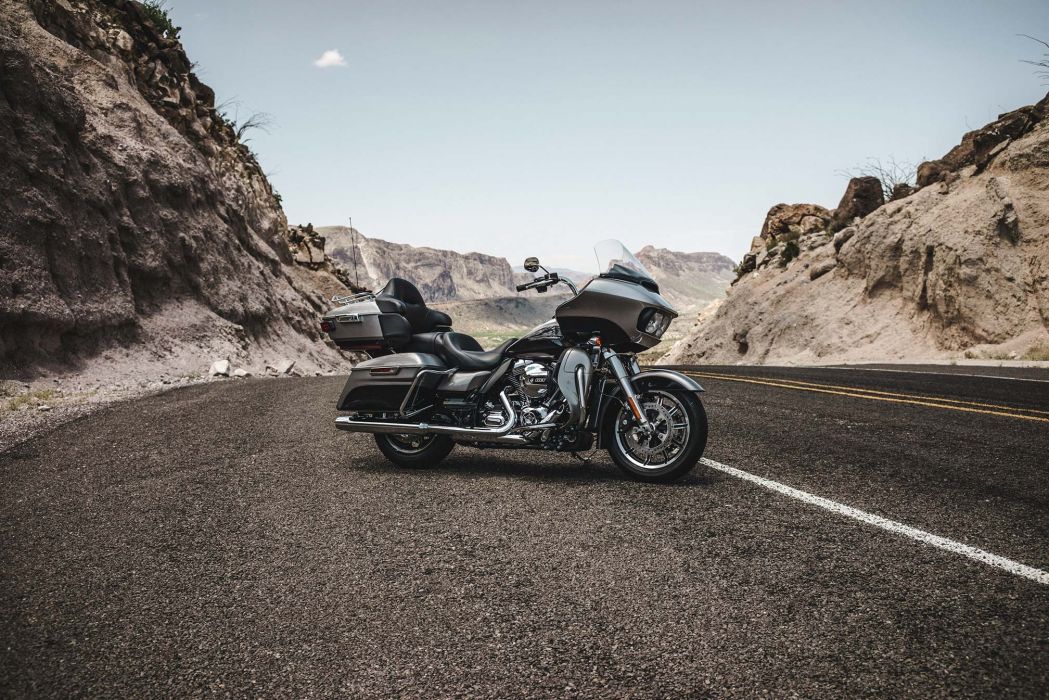 Used Harley-Davidson parked on a rocky, desert road.