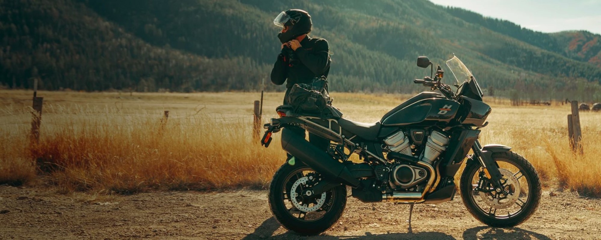 Harley-Davidson Pan America 1250 with rider standing beside